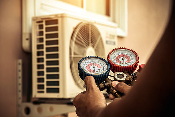 Professional Ductwork Repair technician working in Higley, AZ